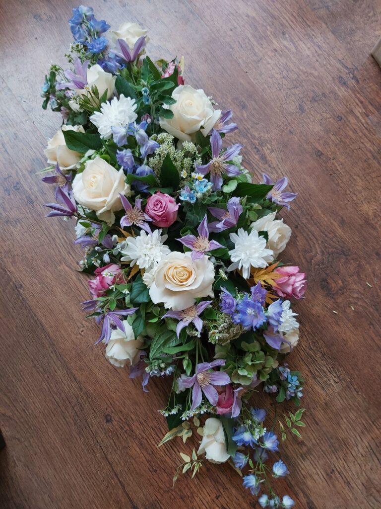 Funeral flowers pastel spray